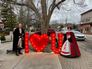 Actors dressed as King and Queen of Hearts during Hearts Afire Weekend in downtown Loveland